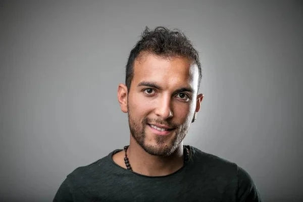 files/depositphotos_124604074-stock-photo-young-latin-american-man-smiling.webp
