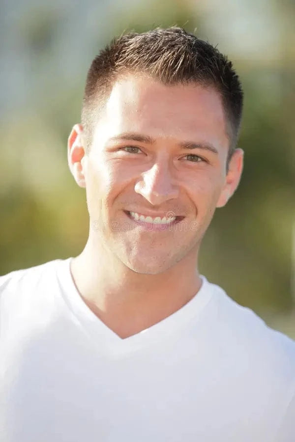 files/handsome-man-smiling-29530620.webp